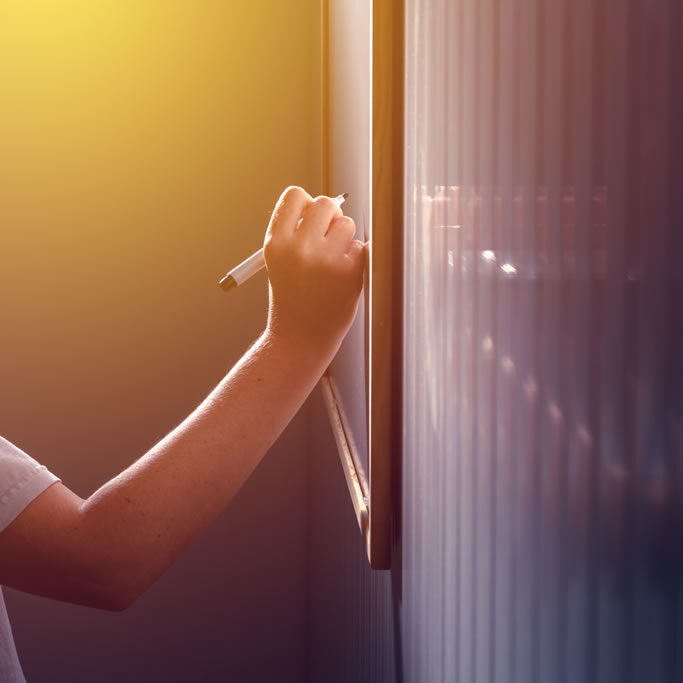 female-businessperson-writing-on-whiteboard-2024-12-06-04-16-25-utc-m I’m here to catalyze bold transformation.